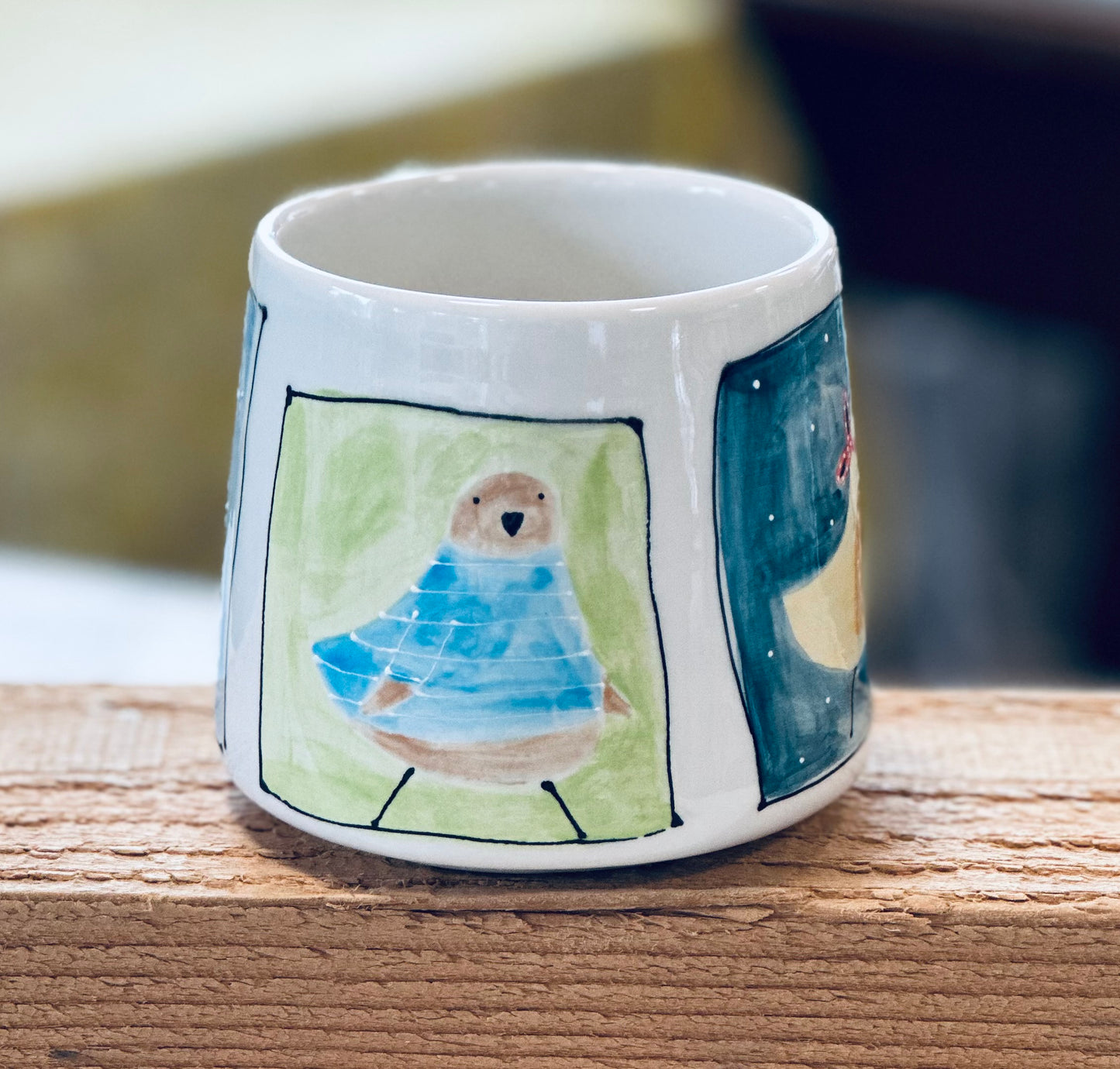 4 framed birds mug