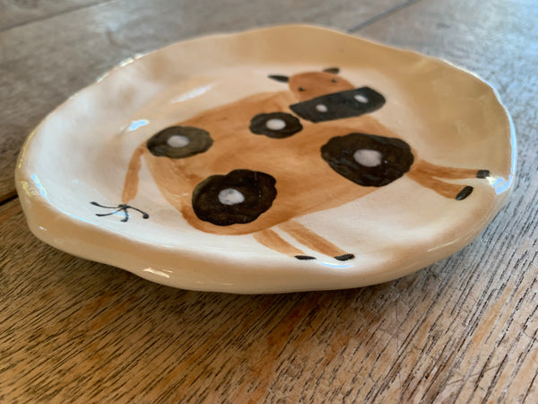 Brown flower cow ring plate