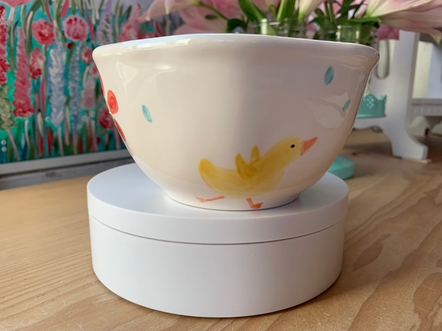 Ducks playing in the rain ice cream bowl