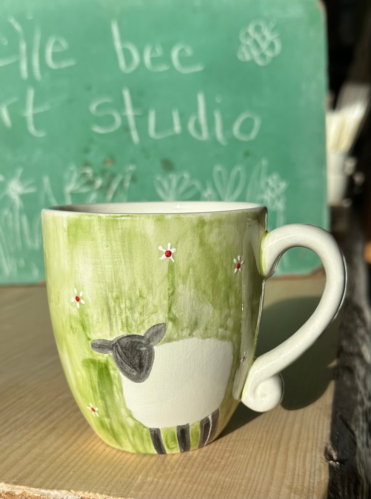 Sheep in the grass mug