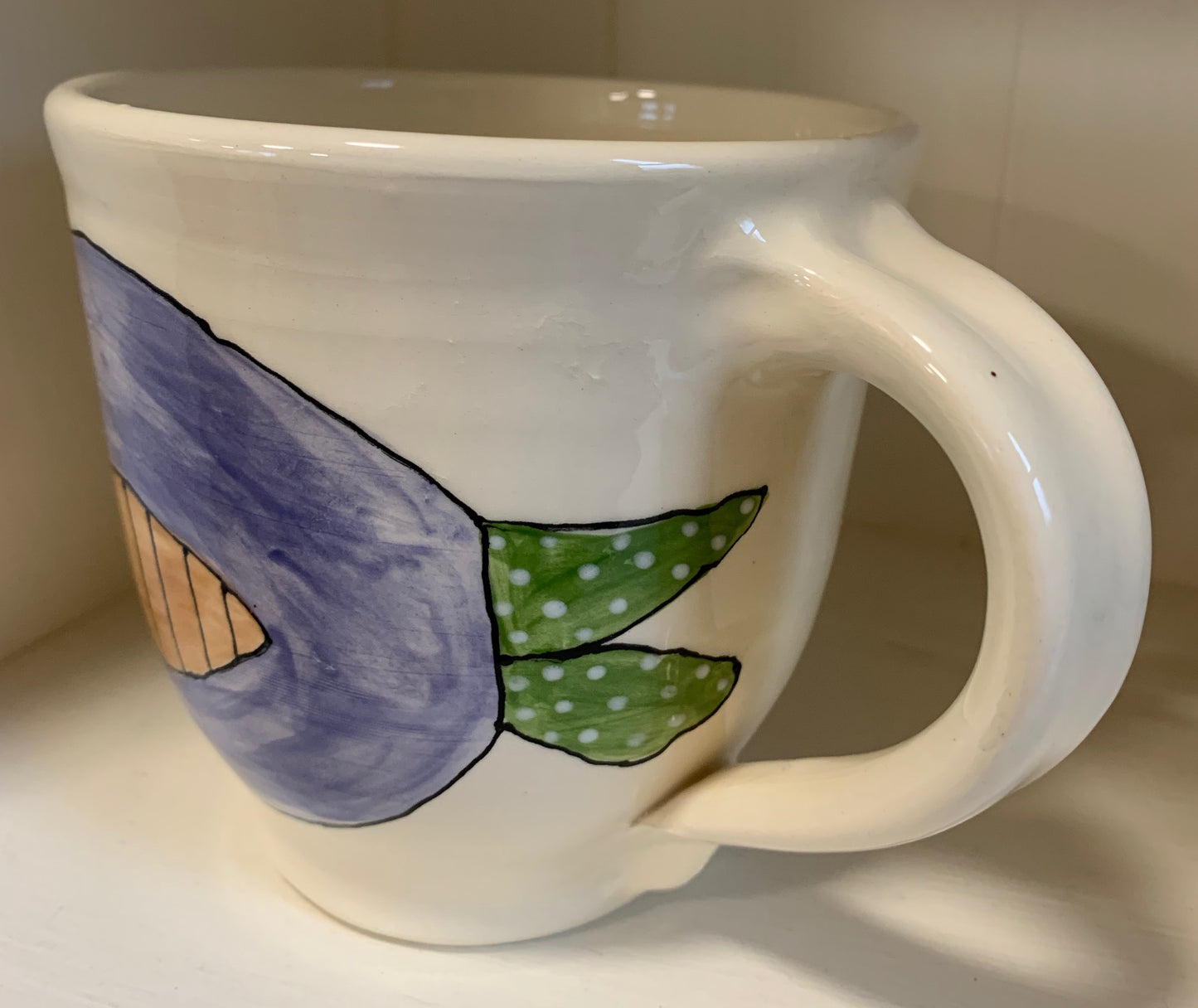 Large wheel thrown mug "Blue & brown fish"