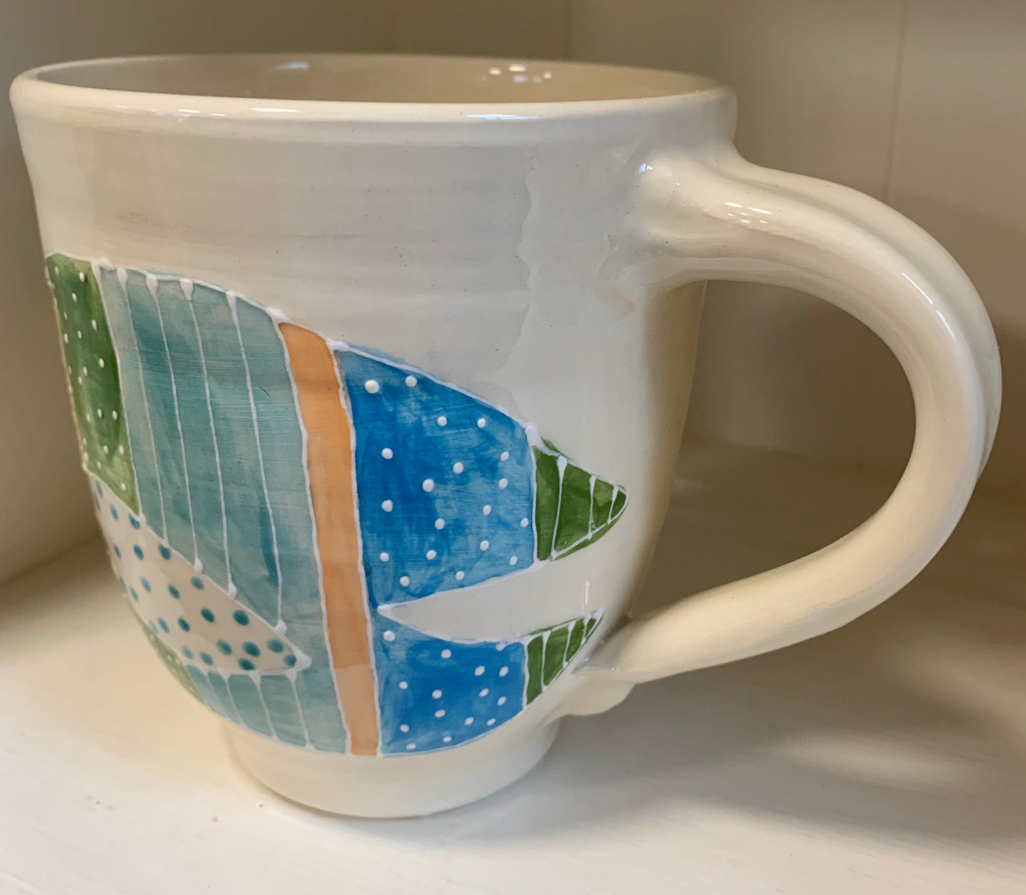 Large wheel thrown mug "Blue & green fish with starfish"