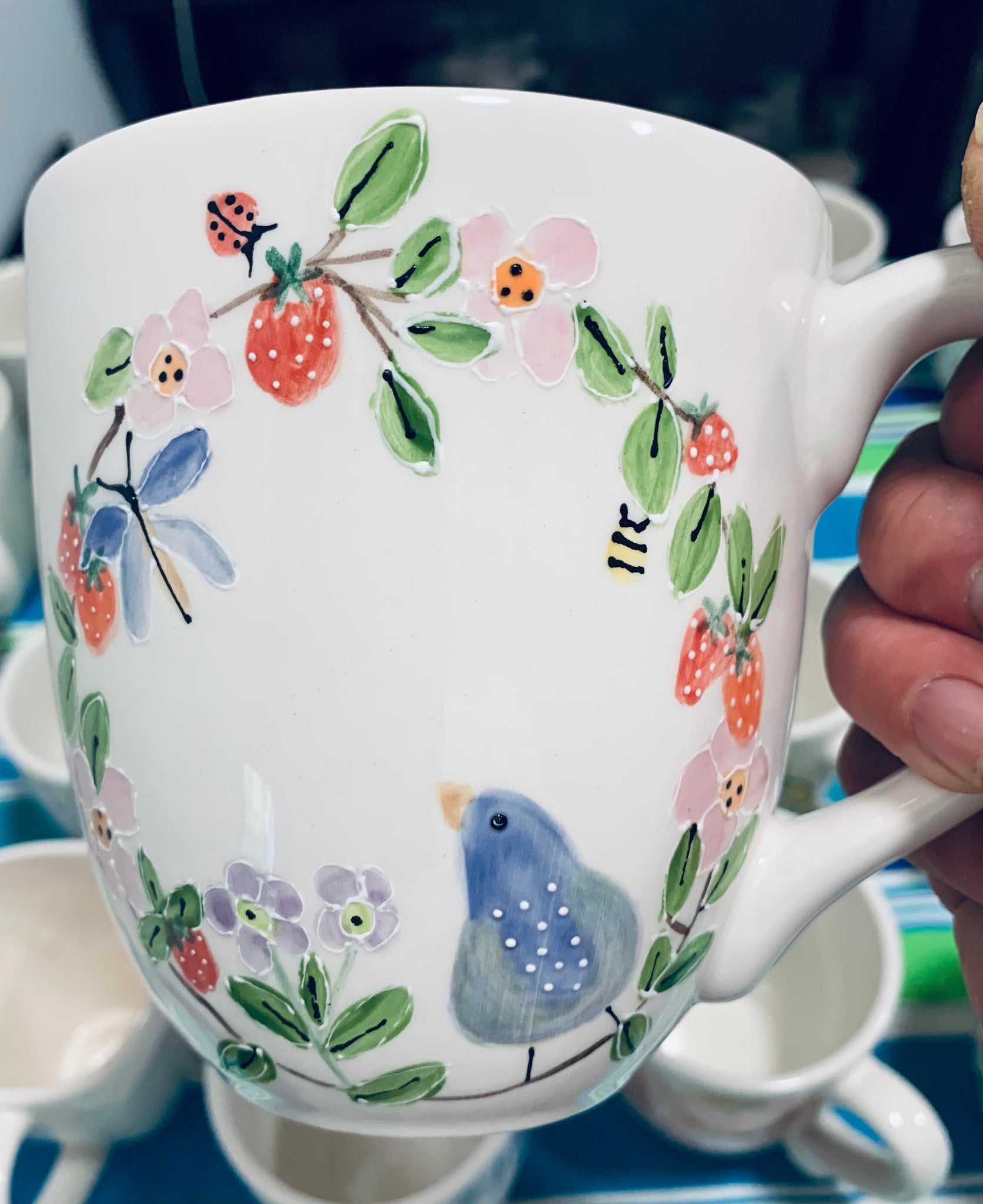 “Bird in strawberry wreath” large coffee or tea mug