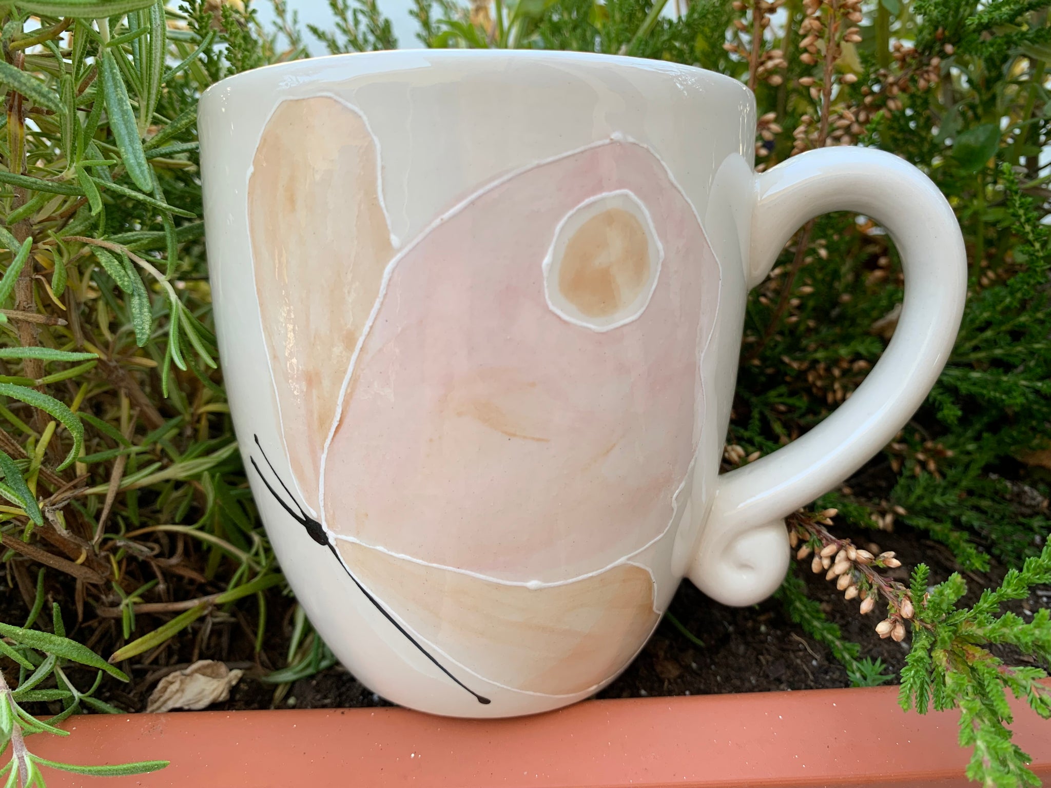 “Pink Butterfly looking down” mug