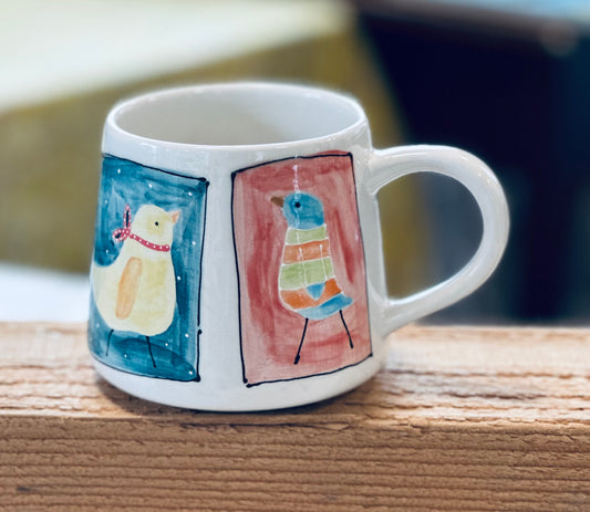 4 framed birds mug