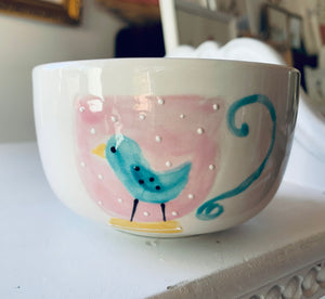 Small Bluebird on tea cup bowl