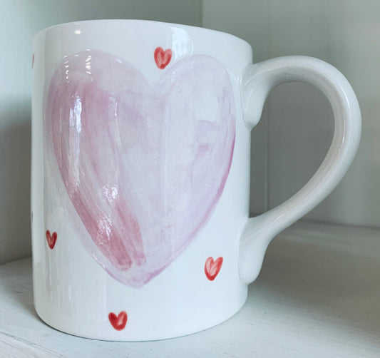 “Hearts fluttering ” mug