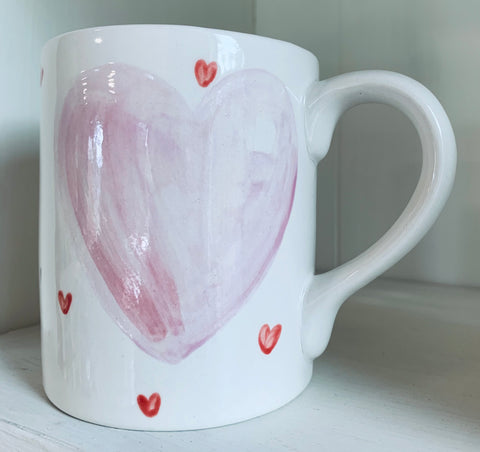 “Hearts fluttering ” mug