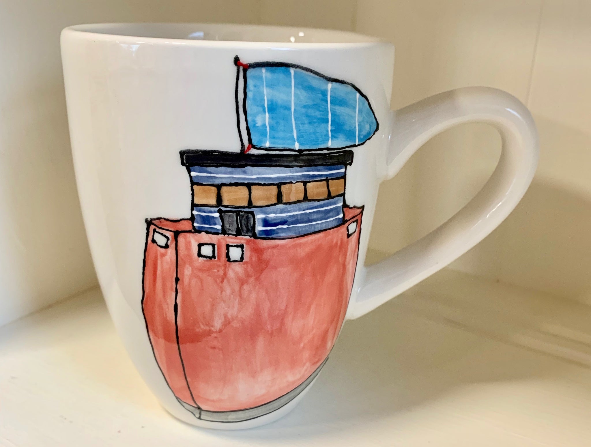 Tall red ship mug