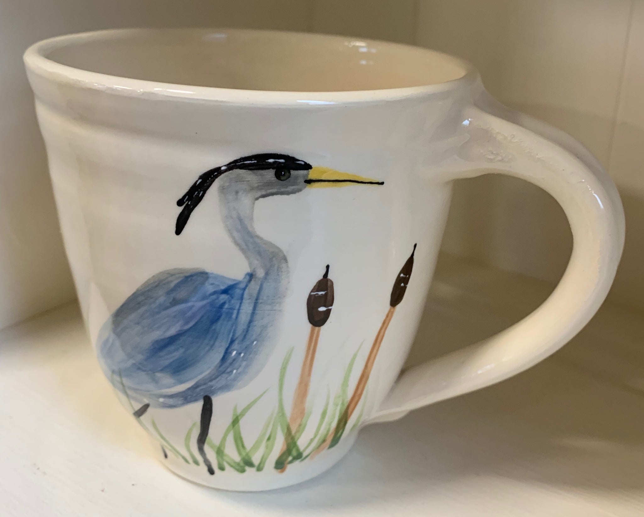 Large wheel thrown mug "Blue Heron looking right"