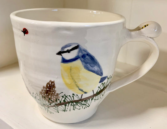 Large wheel thrown mug "Blue Tit and Pinecones"